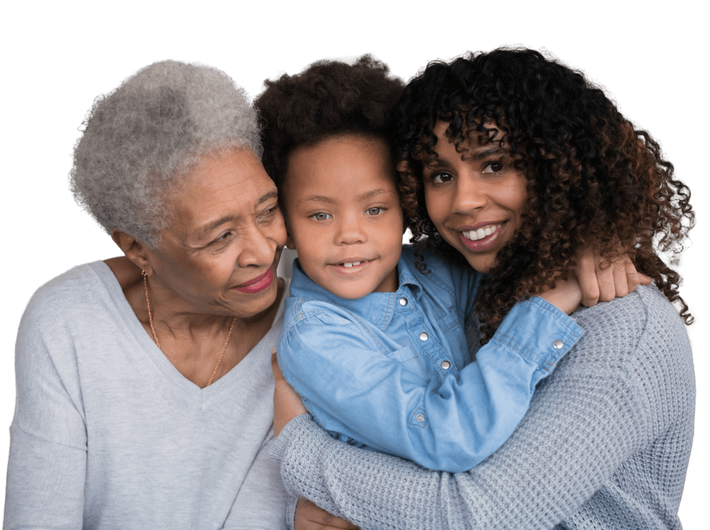 Three generations of women embrace each other 